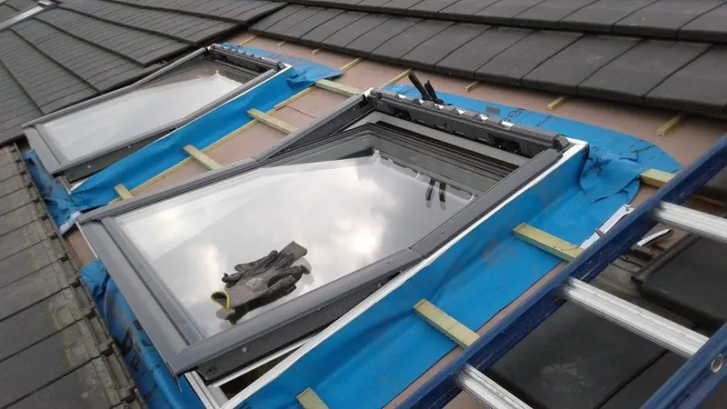 Dakramen te Evergem: dakraam van Velux in het dak, foto 3