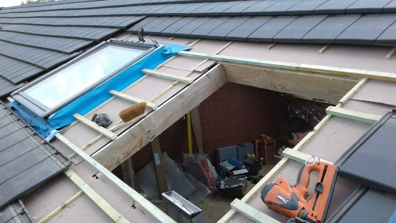 Dakramen te Evergem: dakraam van Velux in het dak, foto 2