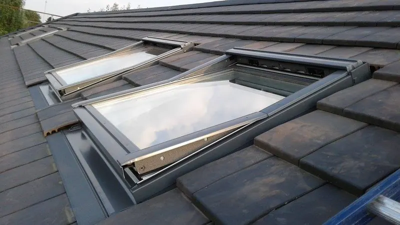 Dakramen te Evergem: dakraam van Velux in het dak, foto 4