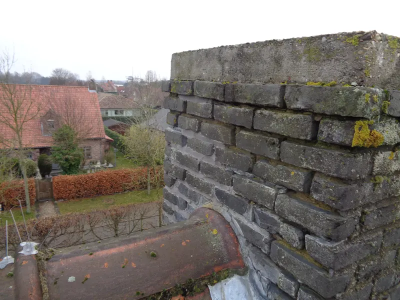 Kraanwerk: hermetselen schouw te Merelbeke: hermetselen van de schouw, foto 1