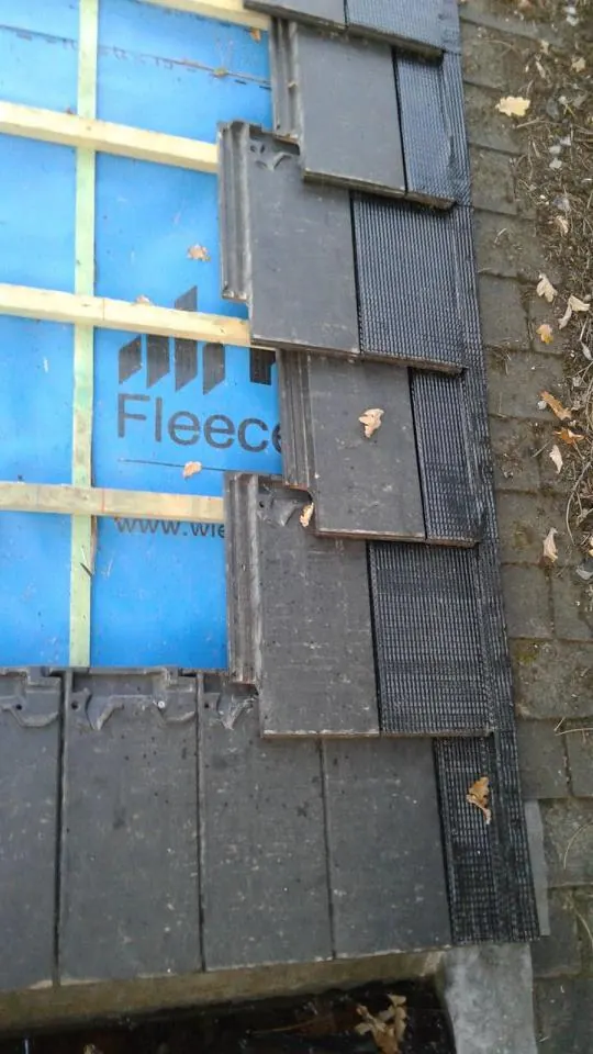 Renovatie hellend dak te Deinze: loodvervanger