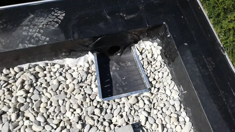 Renovatie plat dak garage te Melle: nieuwe EPDM-dakbedekking, foto 2