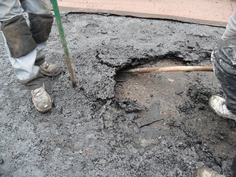 Renovatie plat dak te Lochristi: afbraak van het oude platte dak
